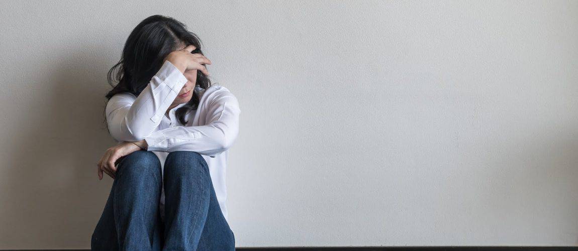 Woman in emotional distress woman with a tired-all-the-time symptom